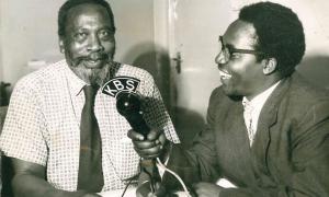 1961. Mr.Stephen Kikumu, a producer on the African National Service of K.B.S records Jomo Kenyatta's appeal at Maralal.