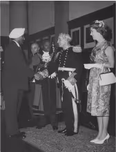 Governor of Kenya Sir Malcolm MacDonald and Mrs MacDonald pictured with Charles Rubia 