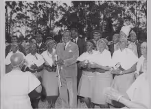 President Jomo Kenyatta being entertained by traditional dancers at State House Nairobi